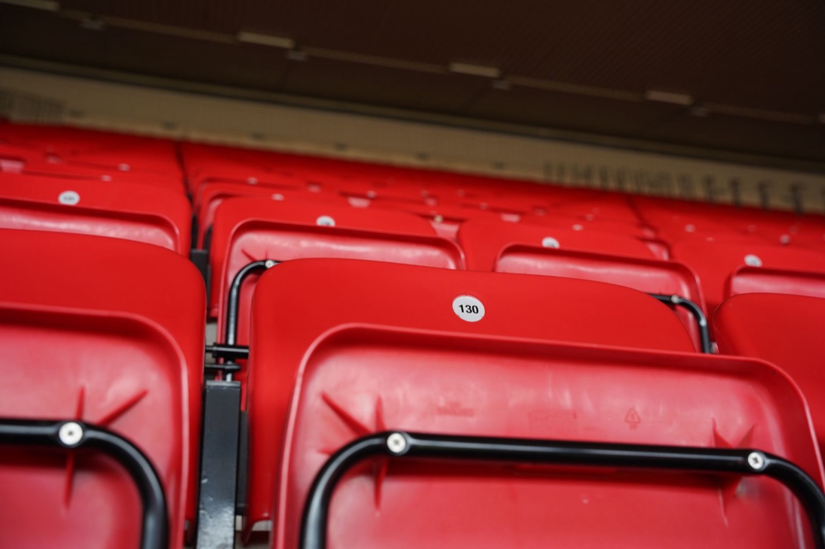 EPL stadium seats with locals