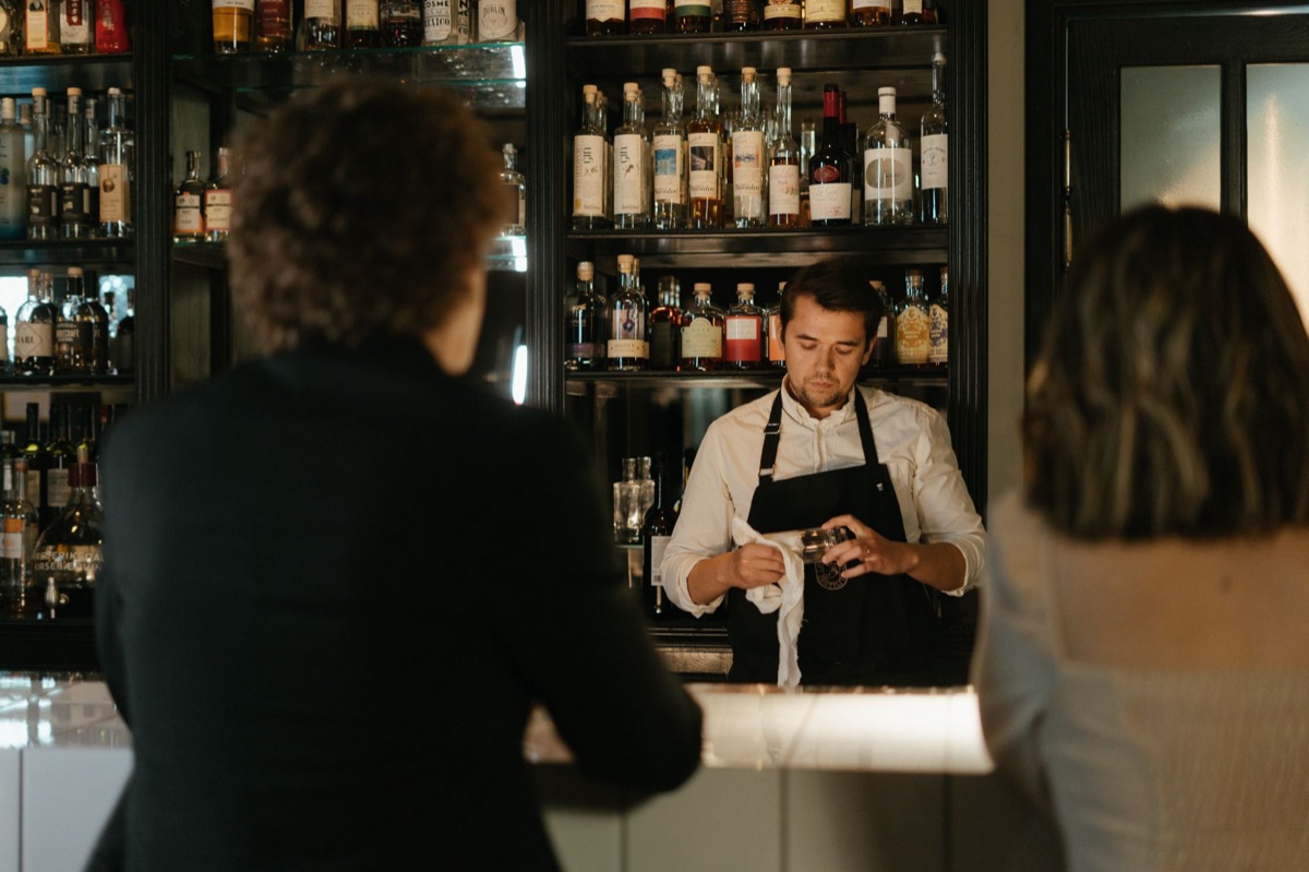 Barman in traditional London pub